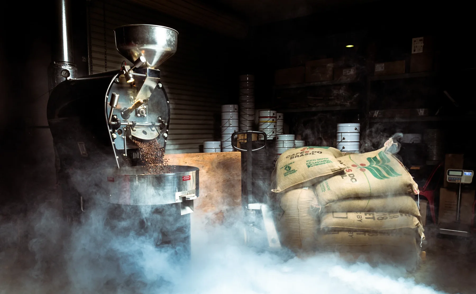 Coffee roaster and green coffee sacks at the Rapid City roastery
